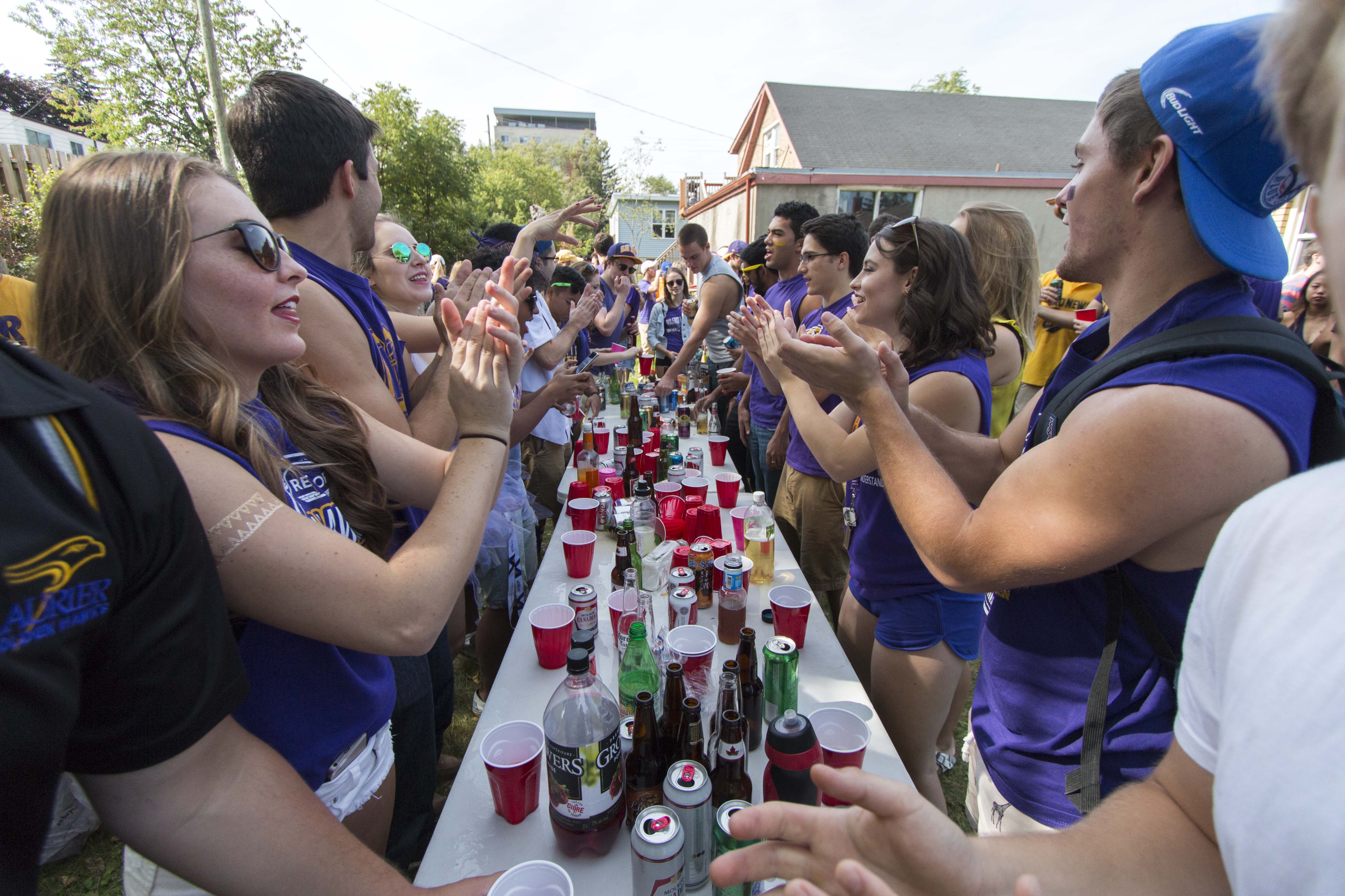 Students play a game of flip cup during Homecoming festivities. Photo by Jessica Dik