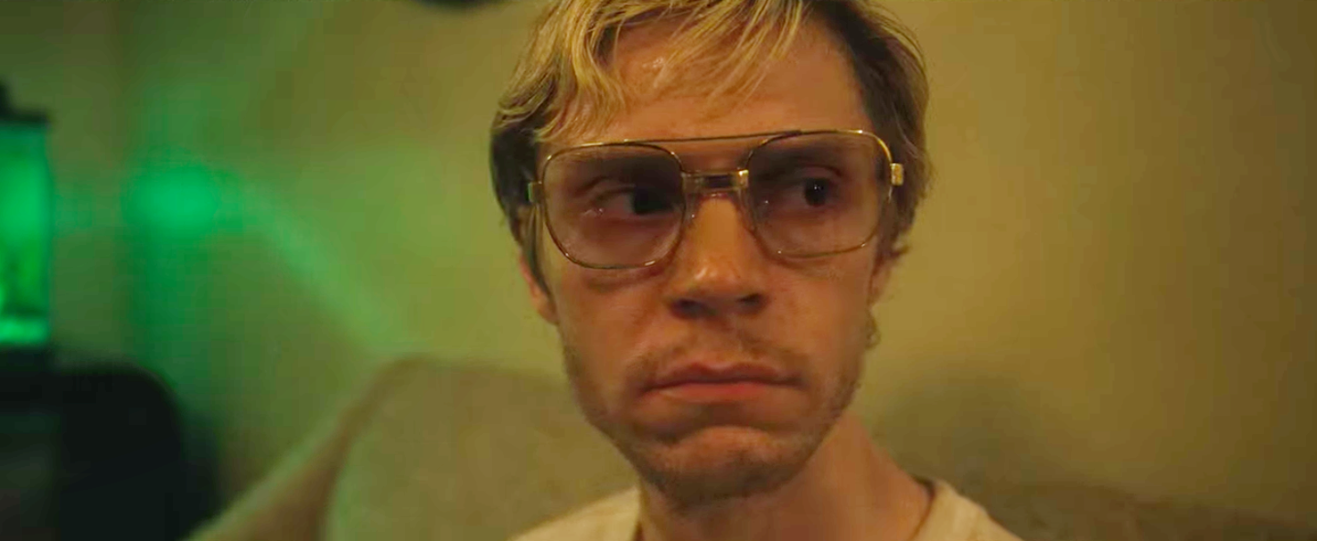 Screenshot from the Netflix series "Monster," featuring Jeffrey Dahmer's face.