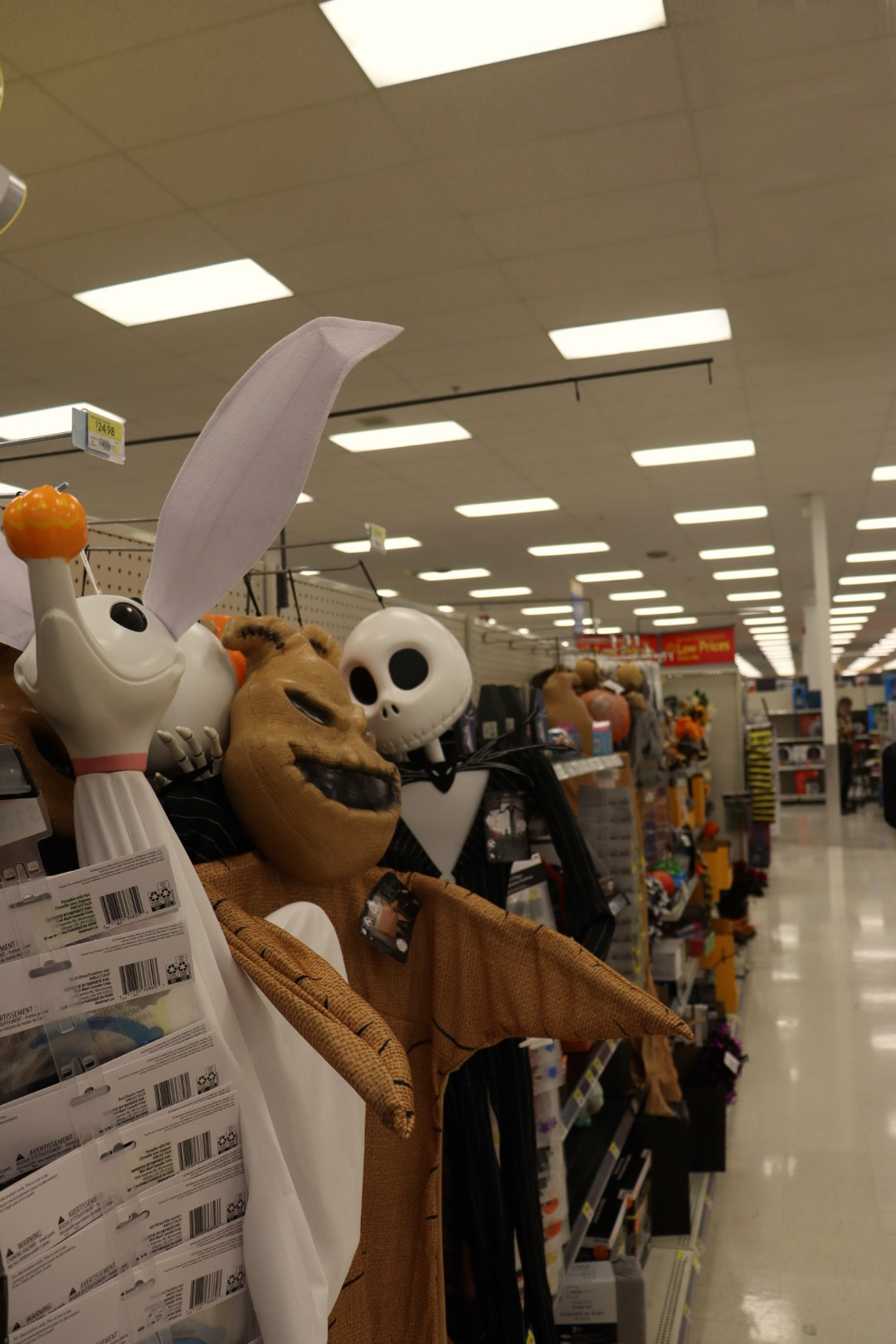 Image of Halloween costumes hanging on racks