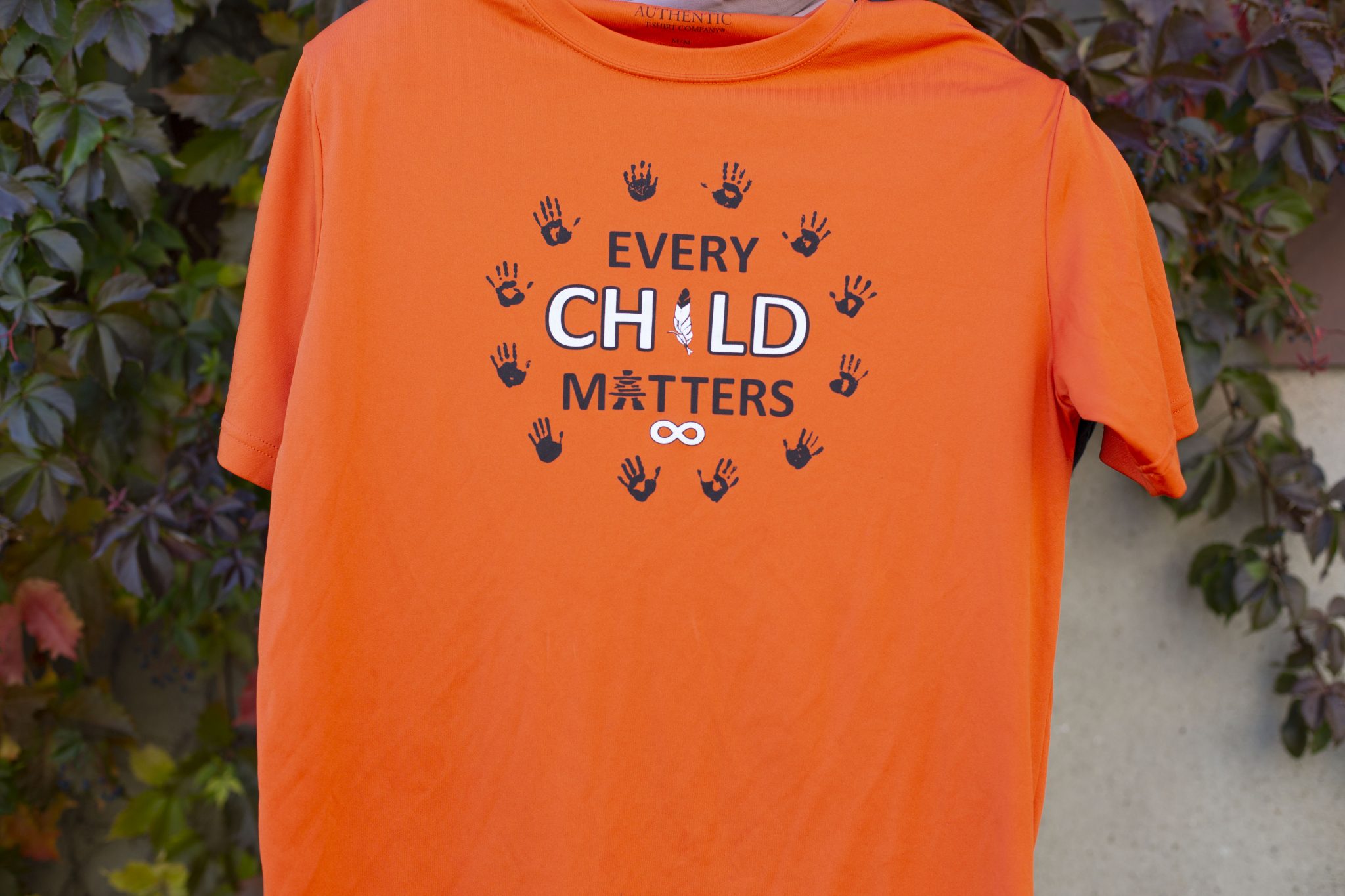Organge shirt with the words "Every child matters" for the National Day for Truth and Reconciliation