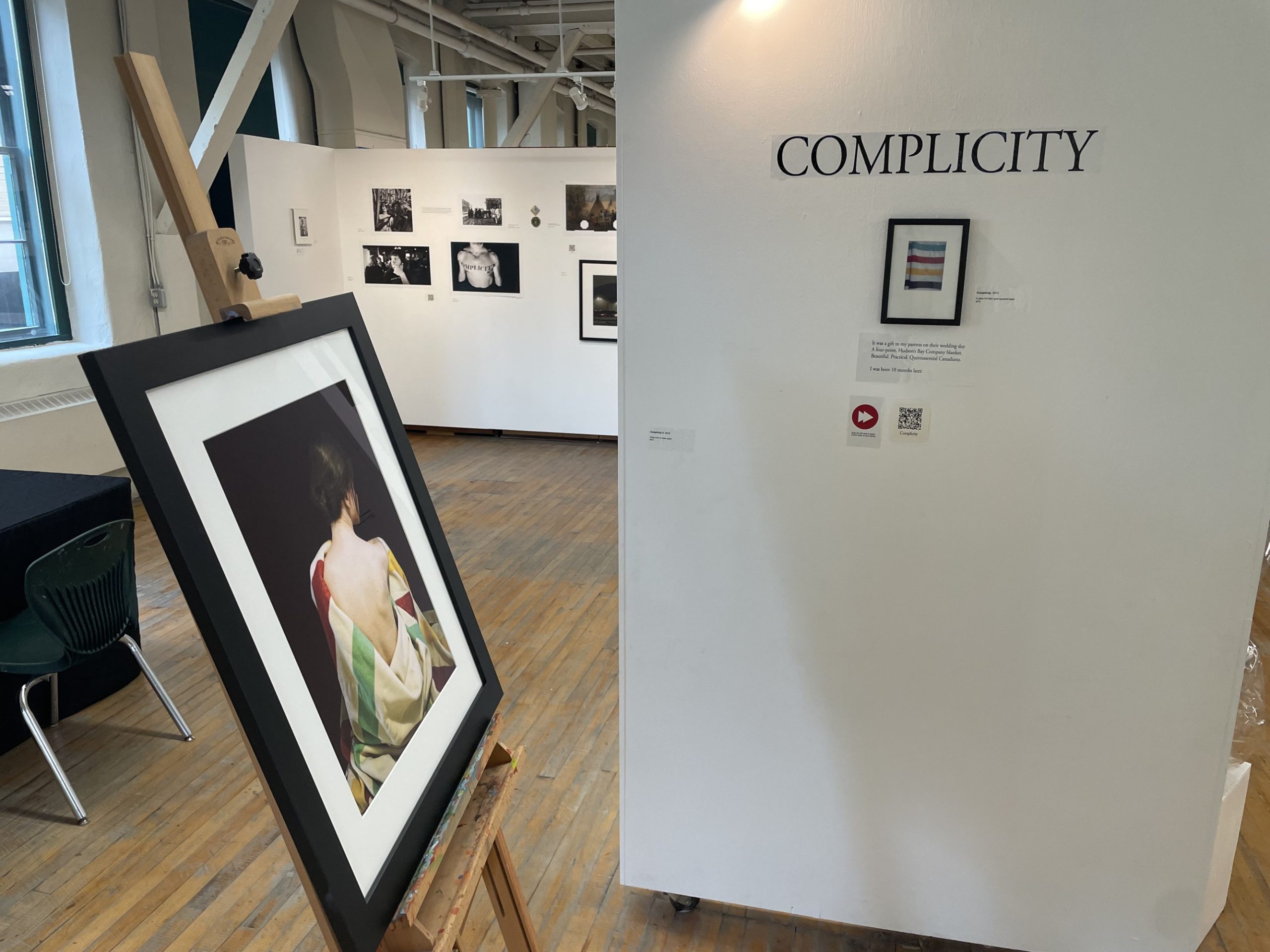 COMPLICITY art exhibit at the button factory