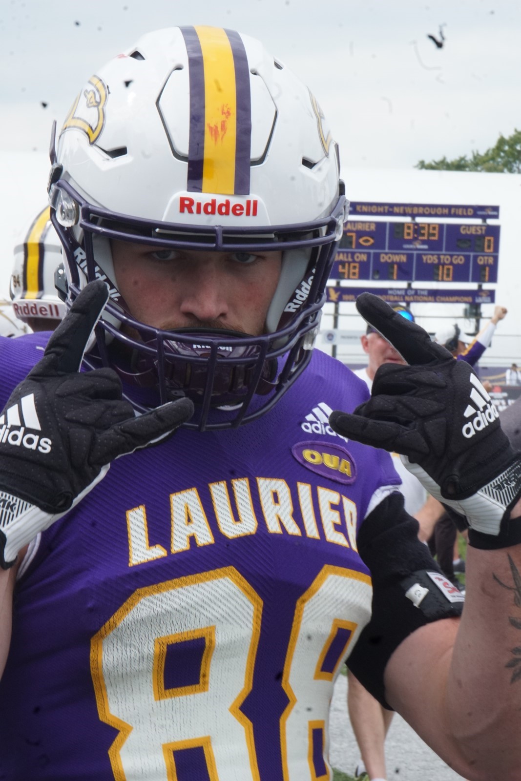 Laurier football player posing