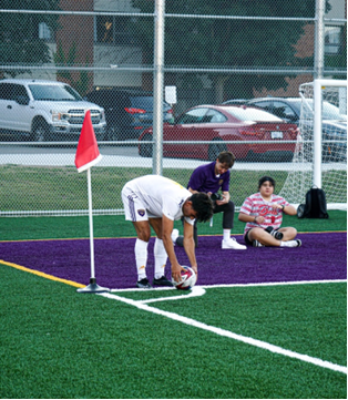 Soccer player lining up for a corner kick