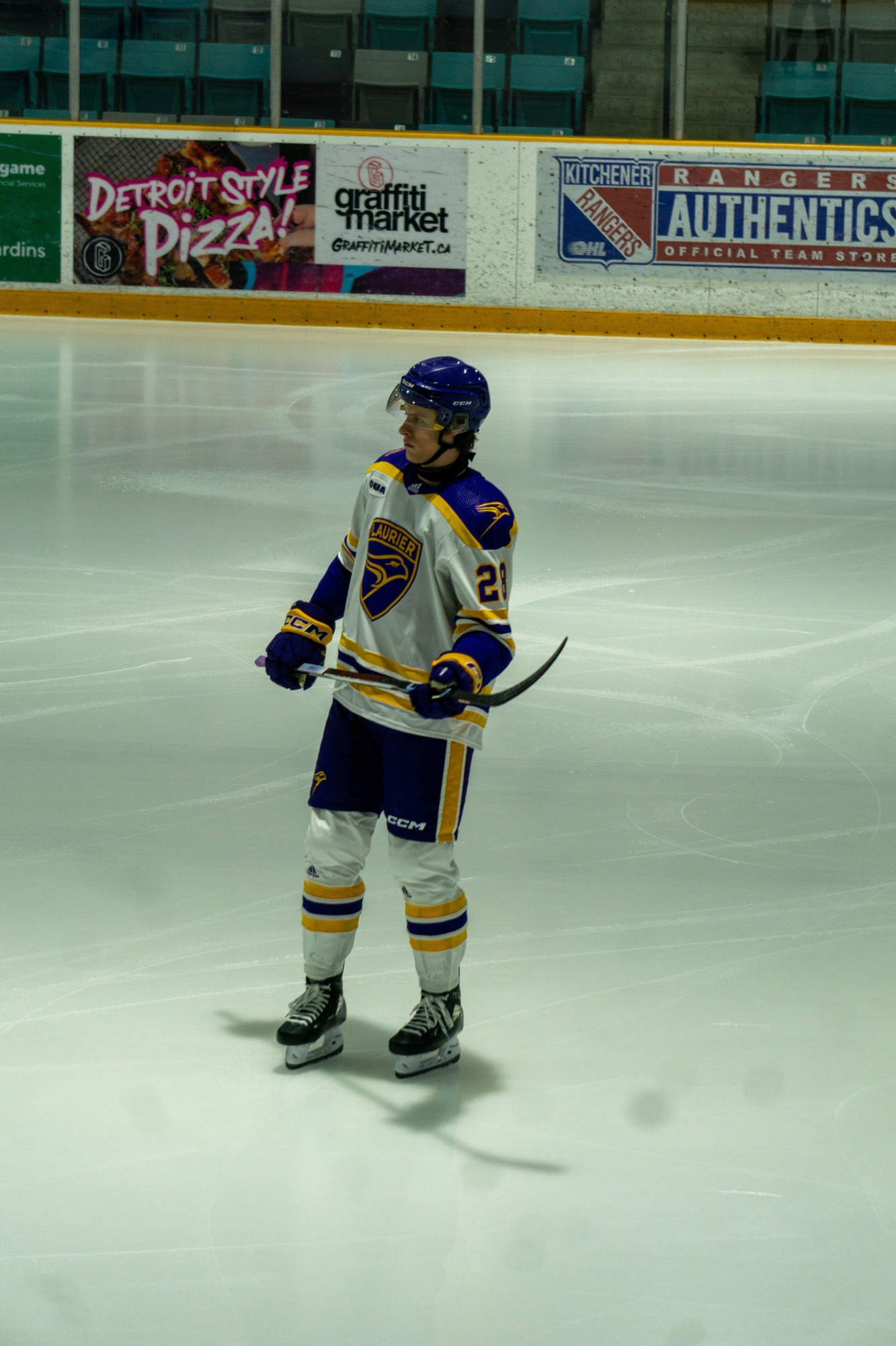 Laurier men's hockey player on the ice
