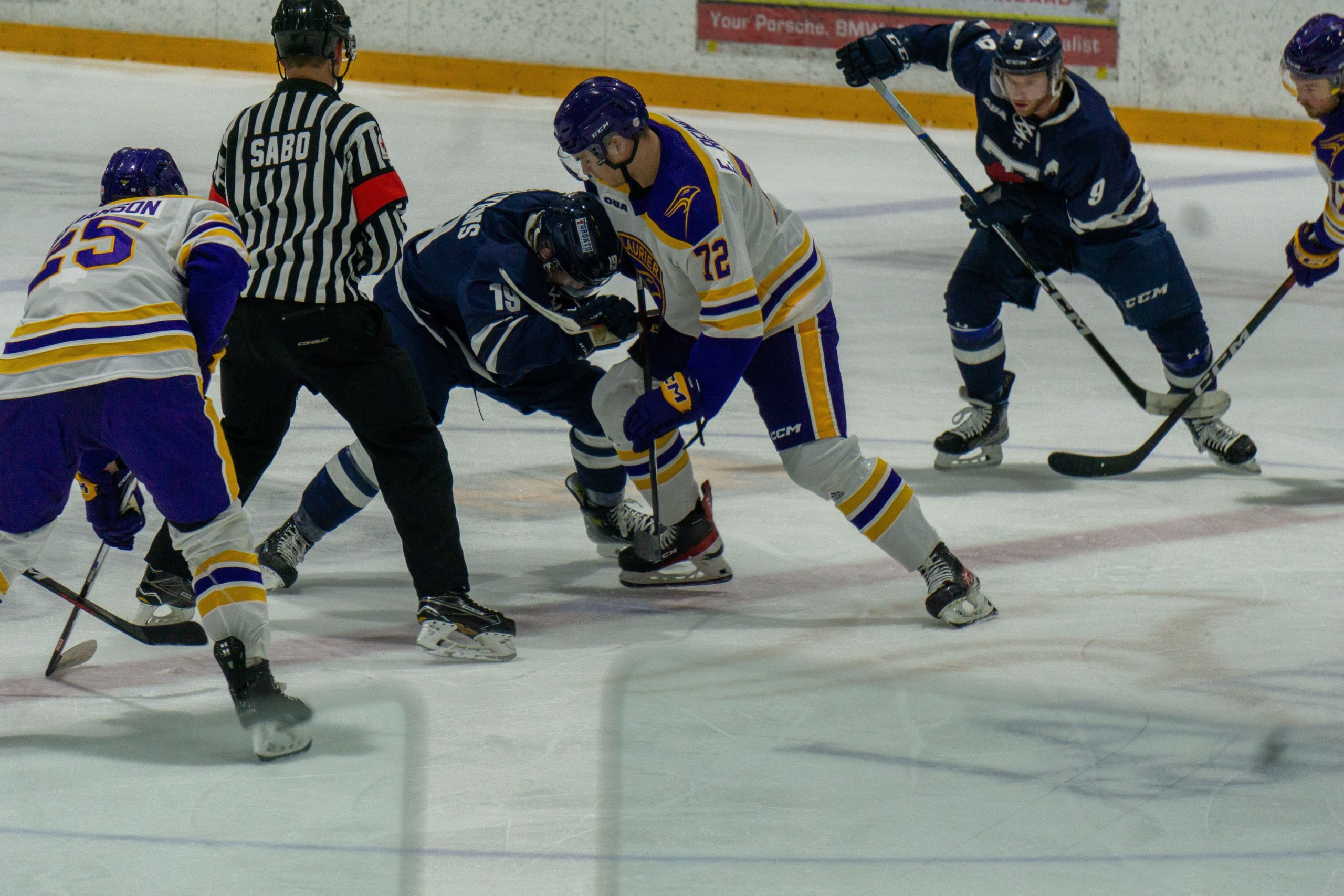 Laurier Men's Hockey player on the ice mid game