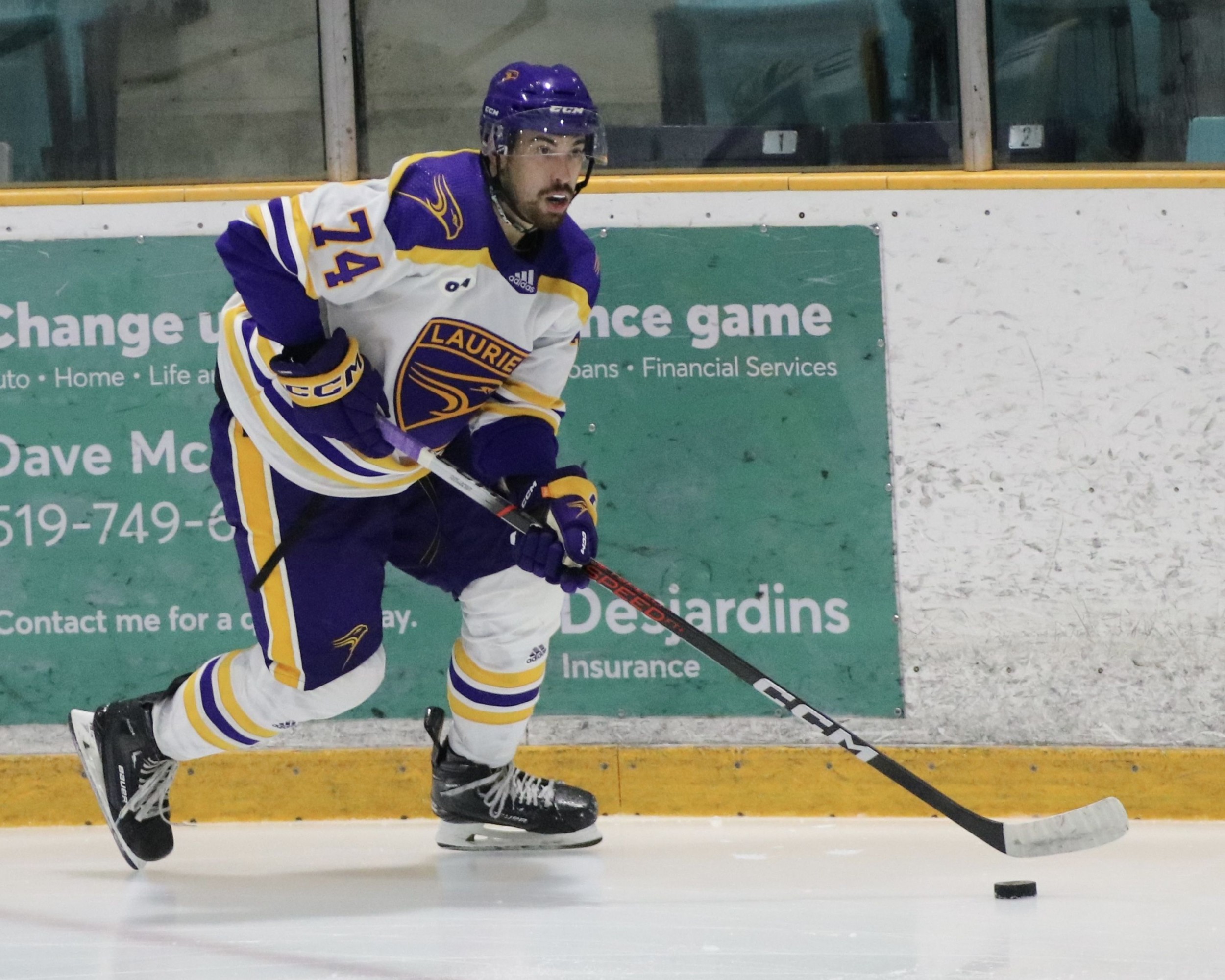 Laurier men's hockey player on ice
